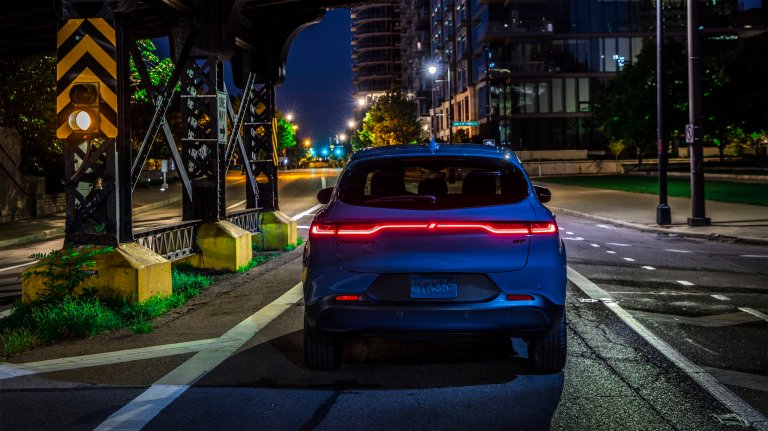 2025 Dodge Hornet rear view, lights on, at night