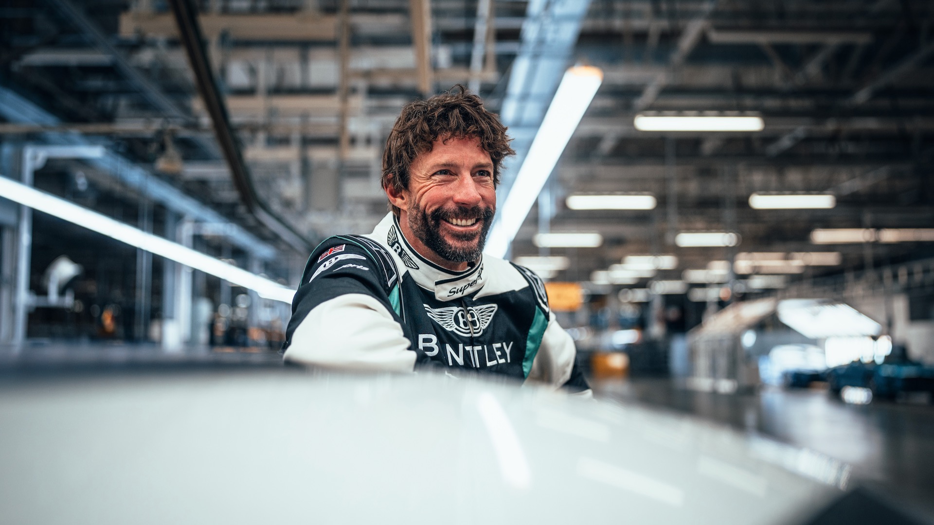 Travis Pastrana in a Bentley racing suit.