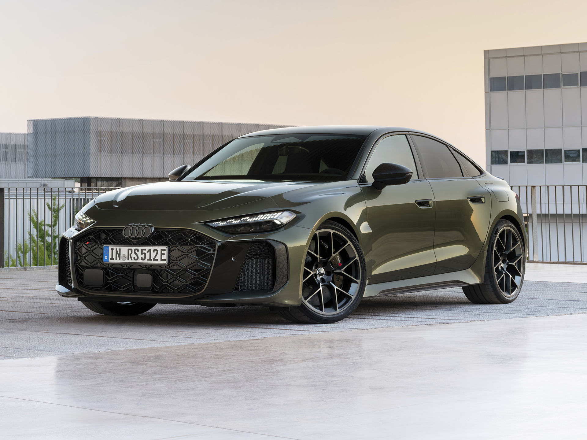 2027 Audi RS5 in Bedford green metallic, outdoor static photo, exterior, three-quarter front view.