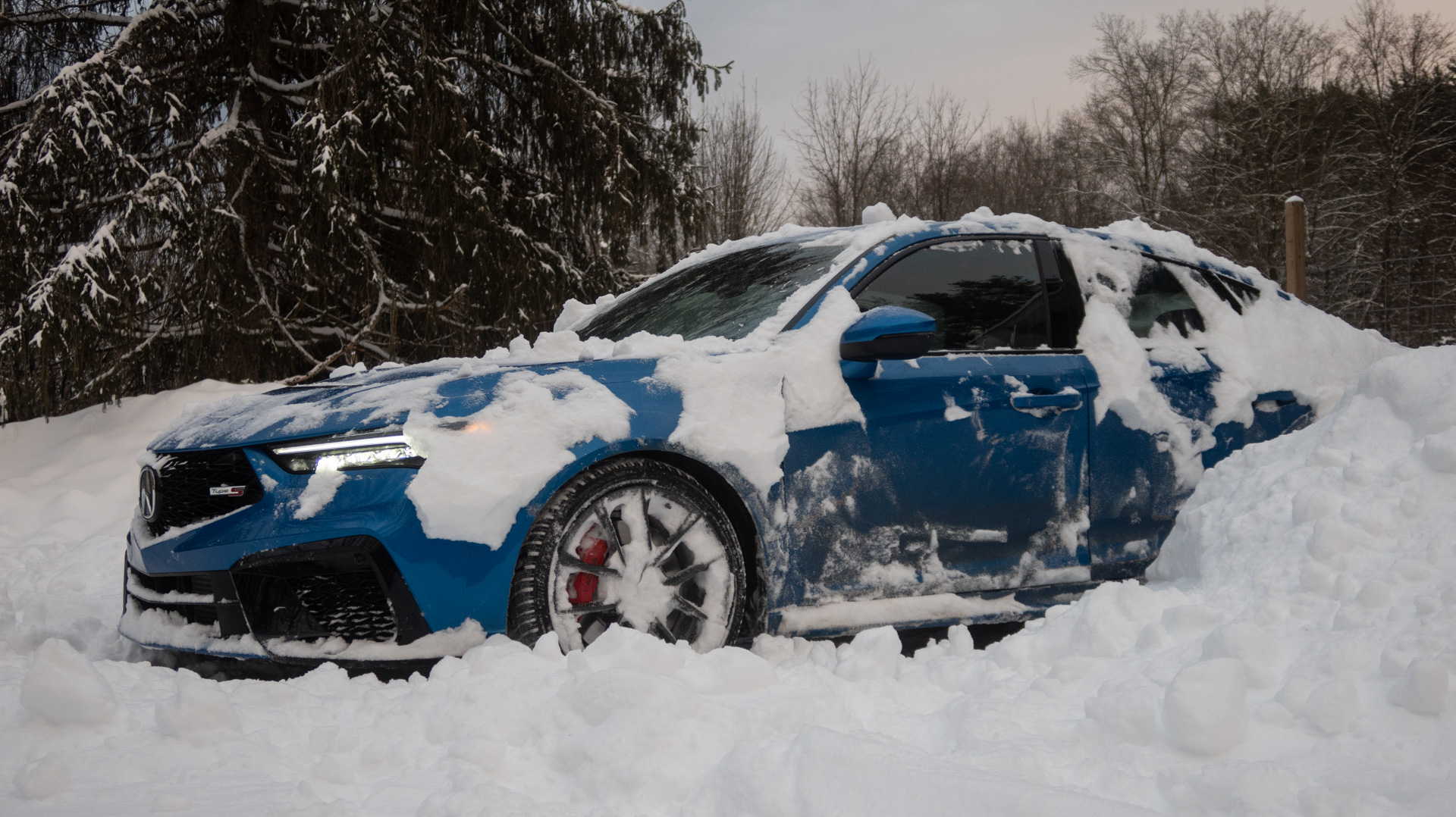 Acura Integra in snow.