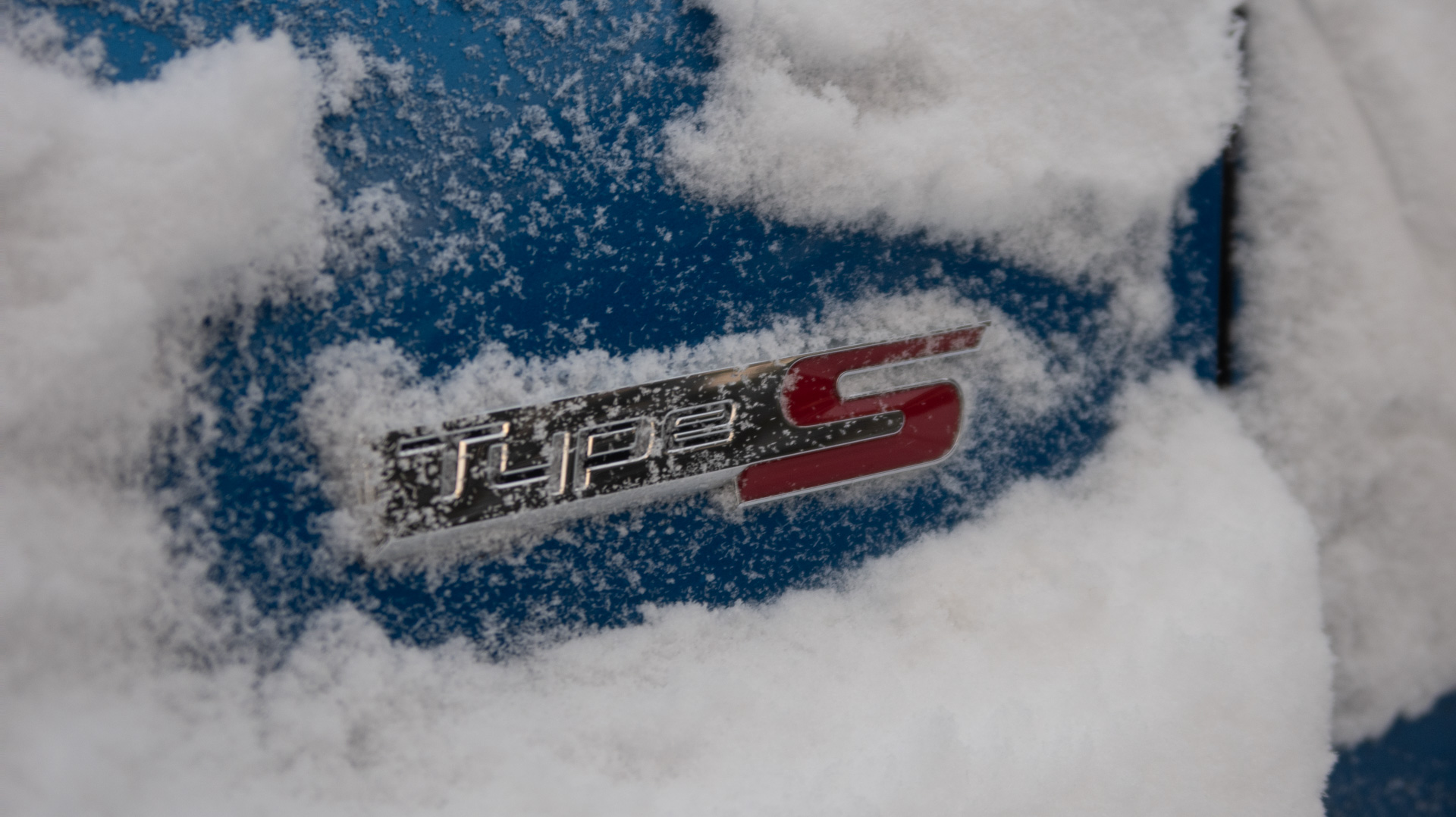 Acura Integra in snow.