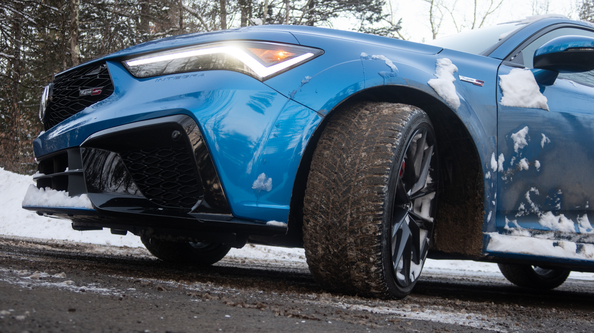 Acura Integra in snow.