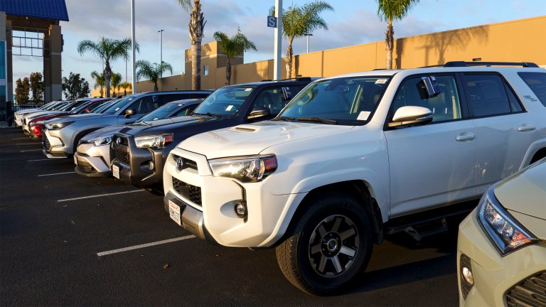 Used Toyota SUVs for sale at a dealer.