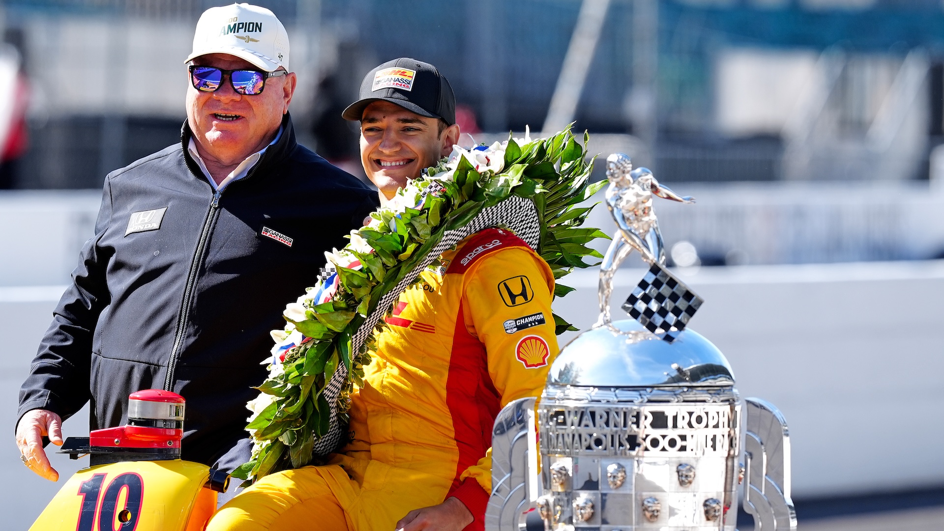 INDIANAPOLIS, IN - MAY 26: IndyCar driver Alex Palou (10) poses for a photo car owner Chip Ganassi after winning the 109th Running of the Indianapolis 500 on May 26, 2025, at the Indianapolis Motor Speedway in Indianapolis, Indiana. (Photo by Brian Spurlock/Icon Sportswire via Getty Images)