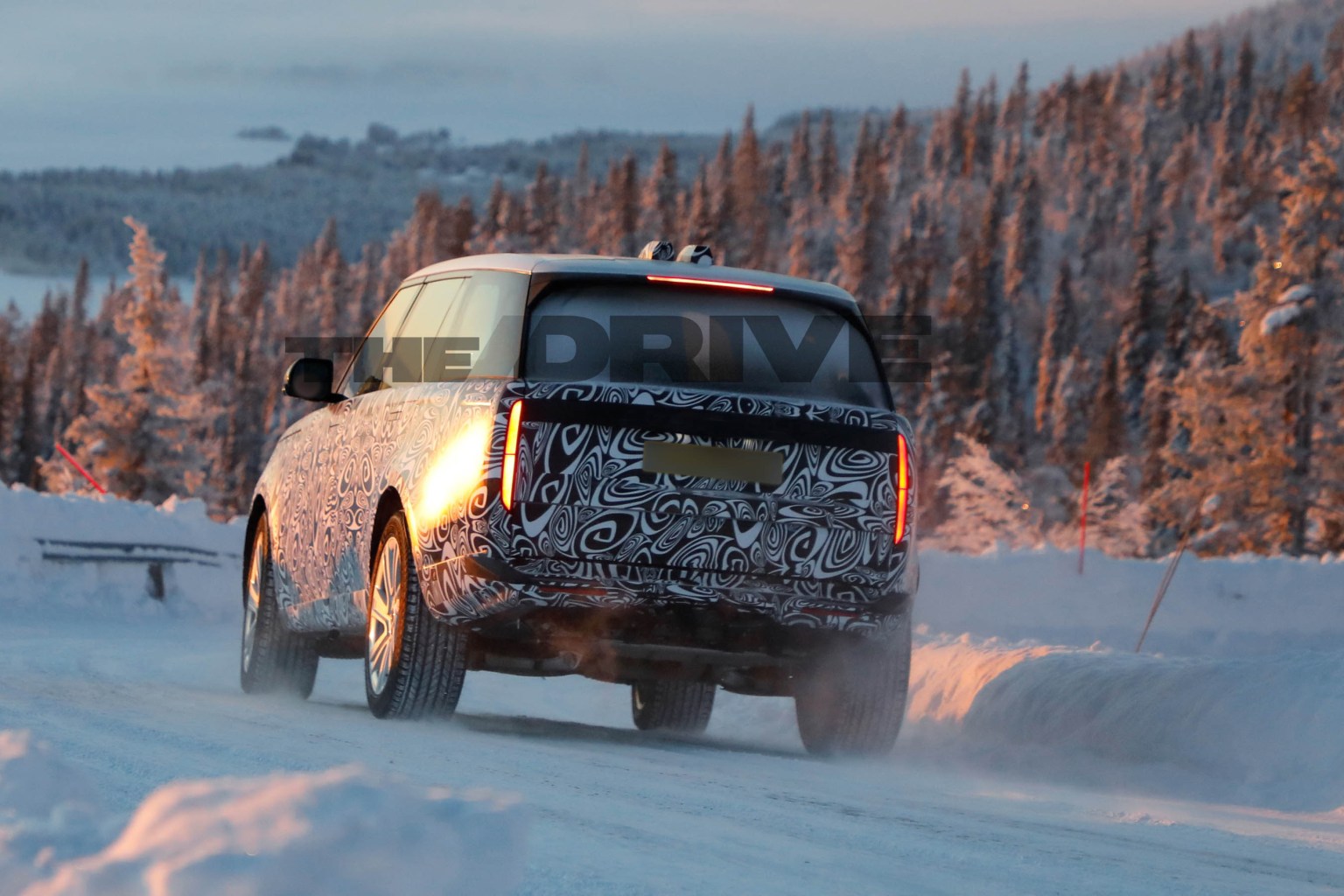 2027 Range Rover Spied Testing Near Arctic Circle With Camo and a New Face