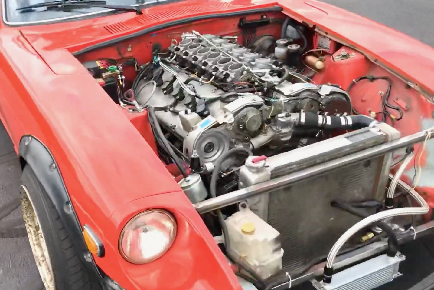 Mercedes-Benz M120 V12 installed in a Datsun 280Z.