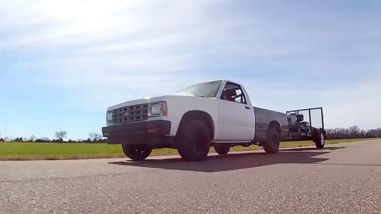 1989 Chevrolet S-10 with VW diesel swap towing a trailer.