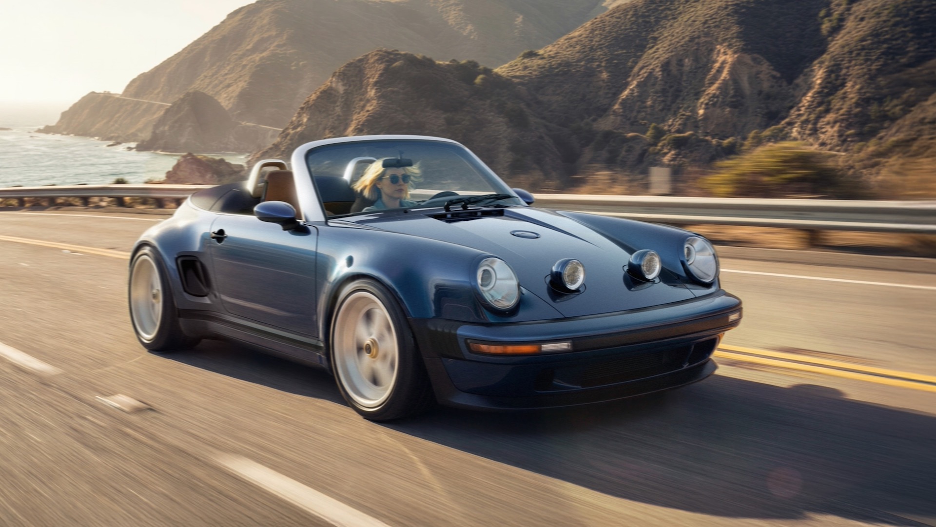 Porsche 911 Carrera Cabriolet Reimagined by Singer in blue.