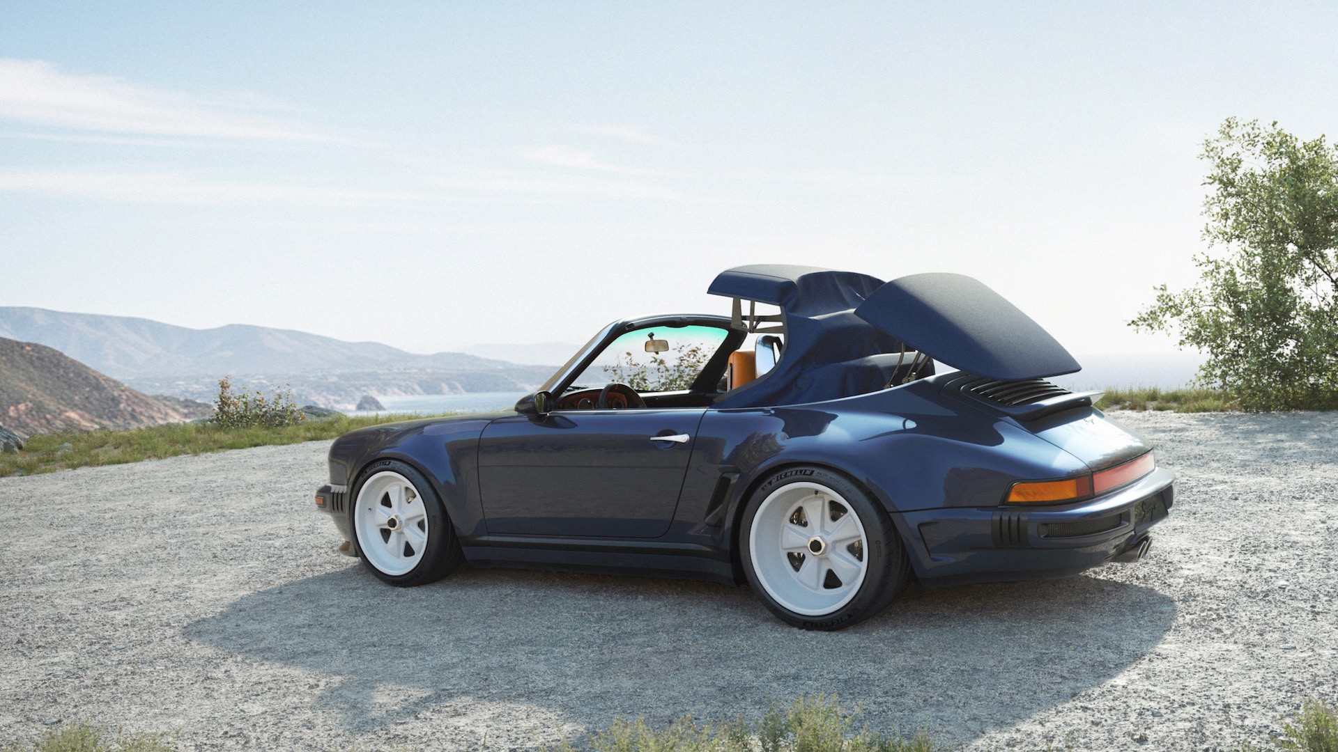Porsche 911 Carrera Cabriolet Reimagined by Singer roof folding.