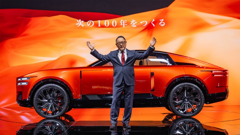 Toyota Chairman Akio Toyoda presents the Century Coupe concept at the 2025 Japan Mobility Show.