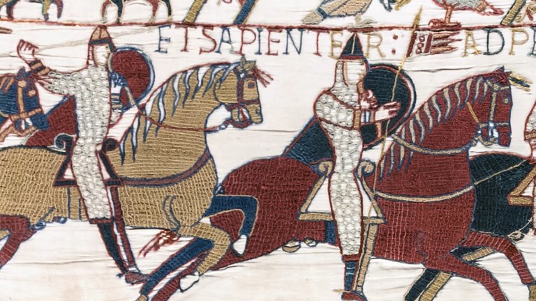 Horses driving on the wrong side of the road.