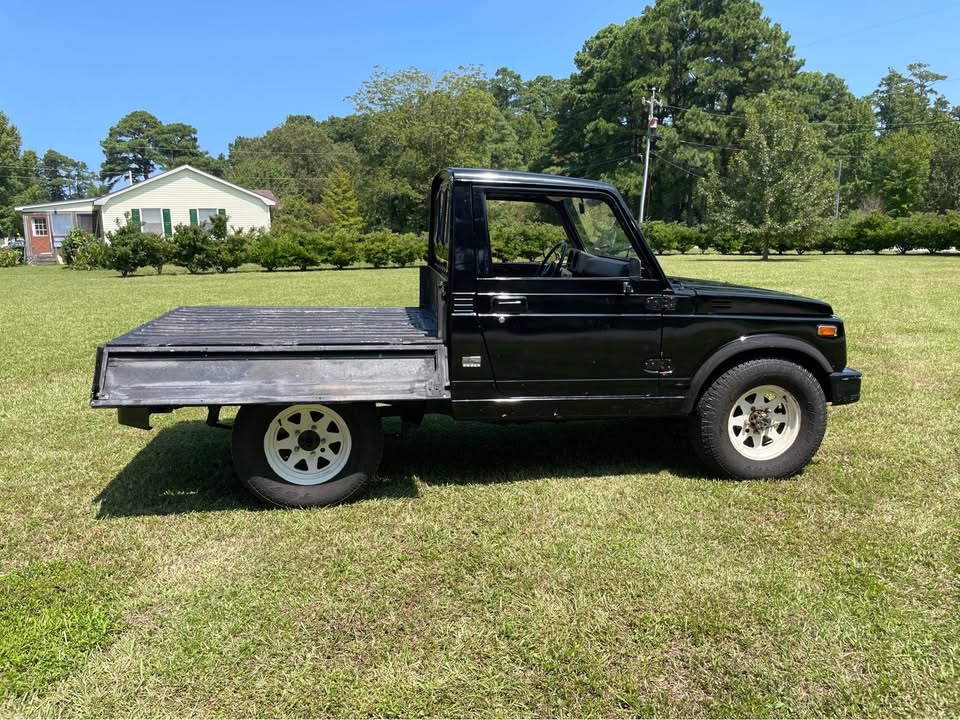 1982 Suzuki SJ410K pickup bed sides down.