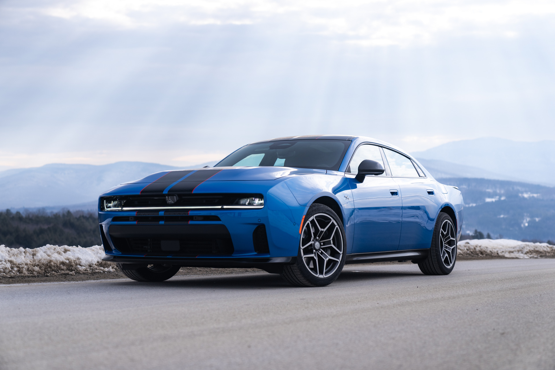 SIXPACK-powered 2026 Dodge Charger R/T, shown in Bludicrous exterior color with Fratzog logo-patterned dual stripes.