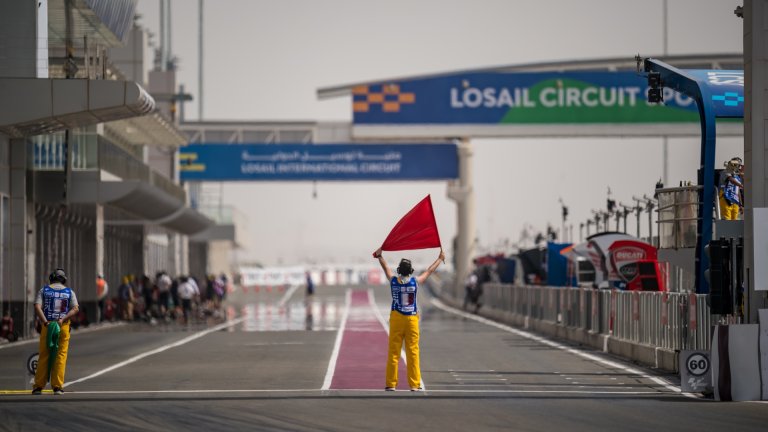 DOHA, QATAR - APRIL 02: Pitlane marshal with red flag before start the first free practice at Losail Circuit on April 02, 2021 in Doha, Qatar. (Photo by Steve Wobser/Getty Images)