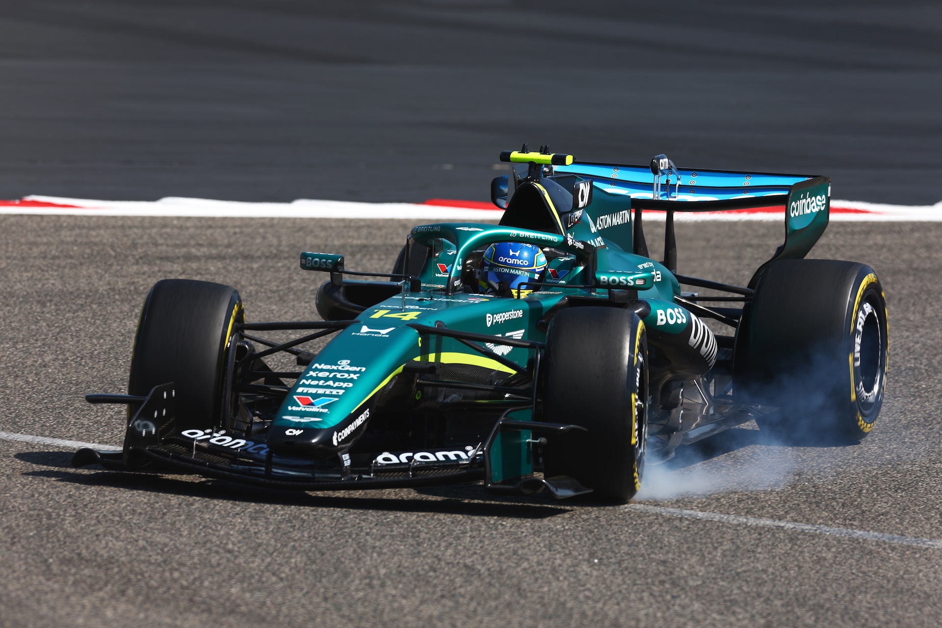 BAHRAIN, BAHRAIN - FEBRUARY 18: Fernando Alonso of Spain and Aston Martin F1 Team locks a wheel under braking during day one of F1 Testing at Bahrain International Circuit on February 18, 2026 in Bahrain, Bahrain. (Photo by Joe Portlock/Getty Images)
