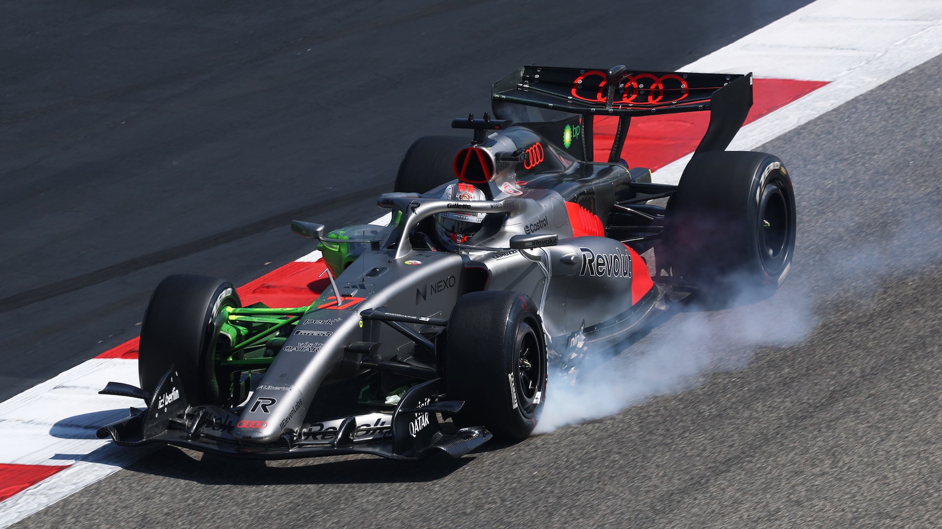 BAHRAIN, BAHRAIN - FEBRUARY 18: Nico Hulkenberg of Germany driving the (27) Audi F1 Team R26 locks a wheel under braking during day one of F1 Testing at Bahrain International Circuit on February 18, 2026 in Bahrain, Bahrain. (Photo by Mark Thompson/Getty Images)