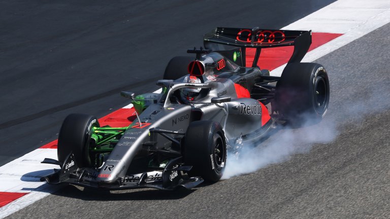 BAHRAIN, BAHRAIN - FEBRUARY 18: Nico Hulkenberg of Germany driving the (27) Audi F1 Team R26 locks a wheel under braking during day one of F1 Testing at Bahrain International Circuit on February 18, 2026 in Bahrain, Bahrain. (Photo by Mark Thompson/Getty Images)