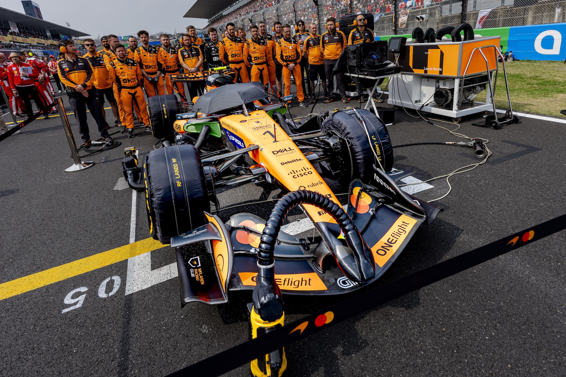 The McLaren team stands during the national anthem at the Formula 1 Japan Suzuka race at the Suzuka Formula 1 circuit on March 29, 2025, in Suzuka, Japan. (Photo by Marcel van Dorst/EYE4IMAGES/NurPhoto via Getty Images)