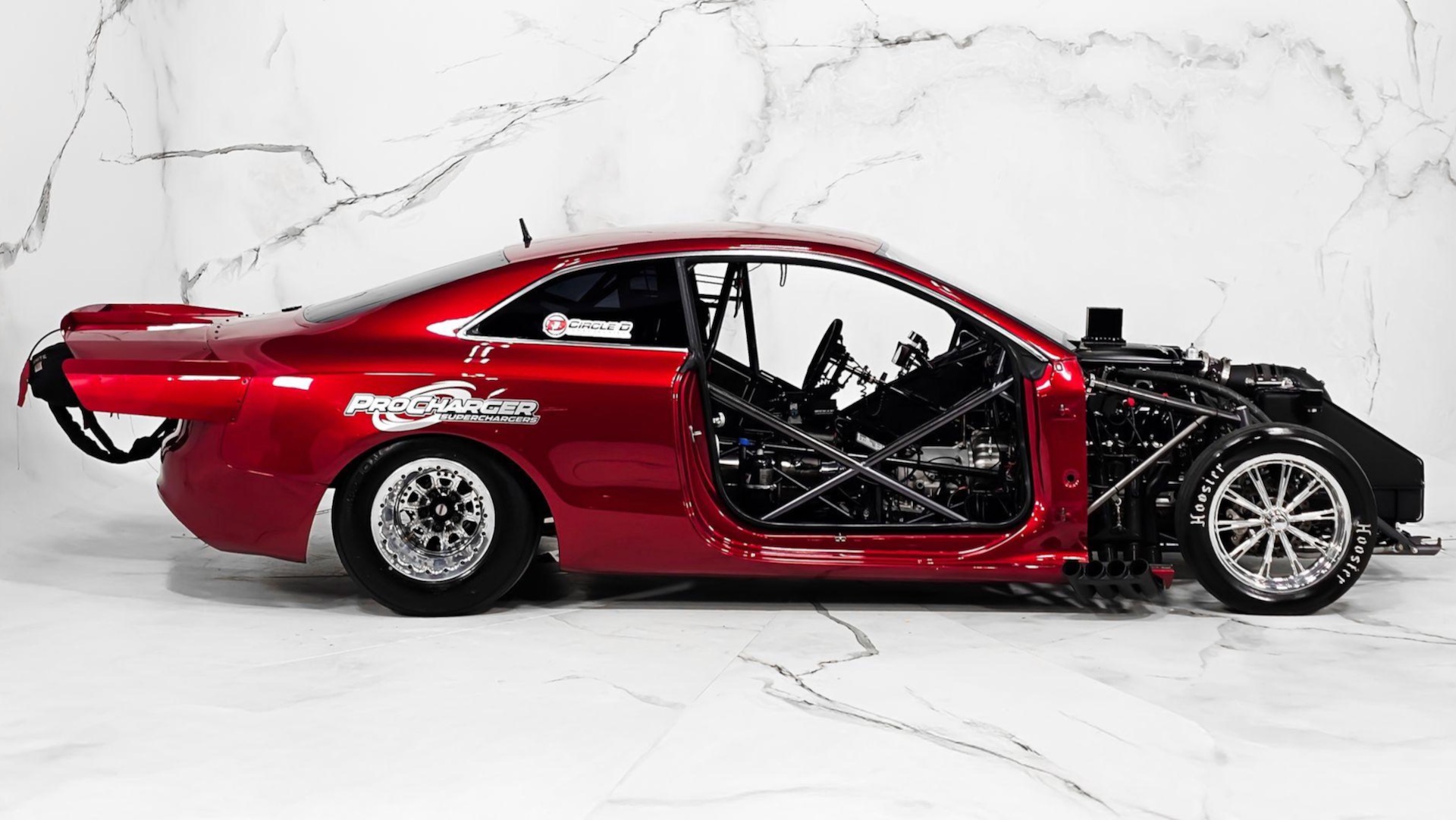 Daddy Dave Audi RS 5 profile view with doors and hood off.