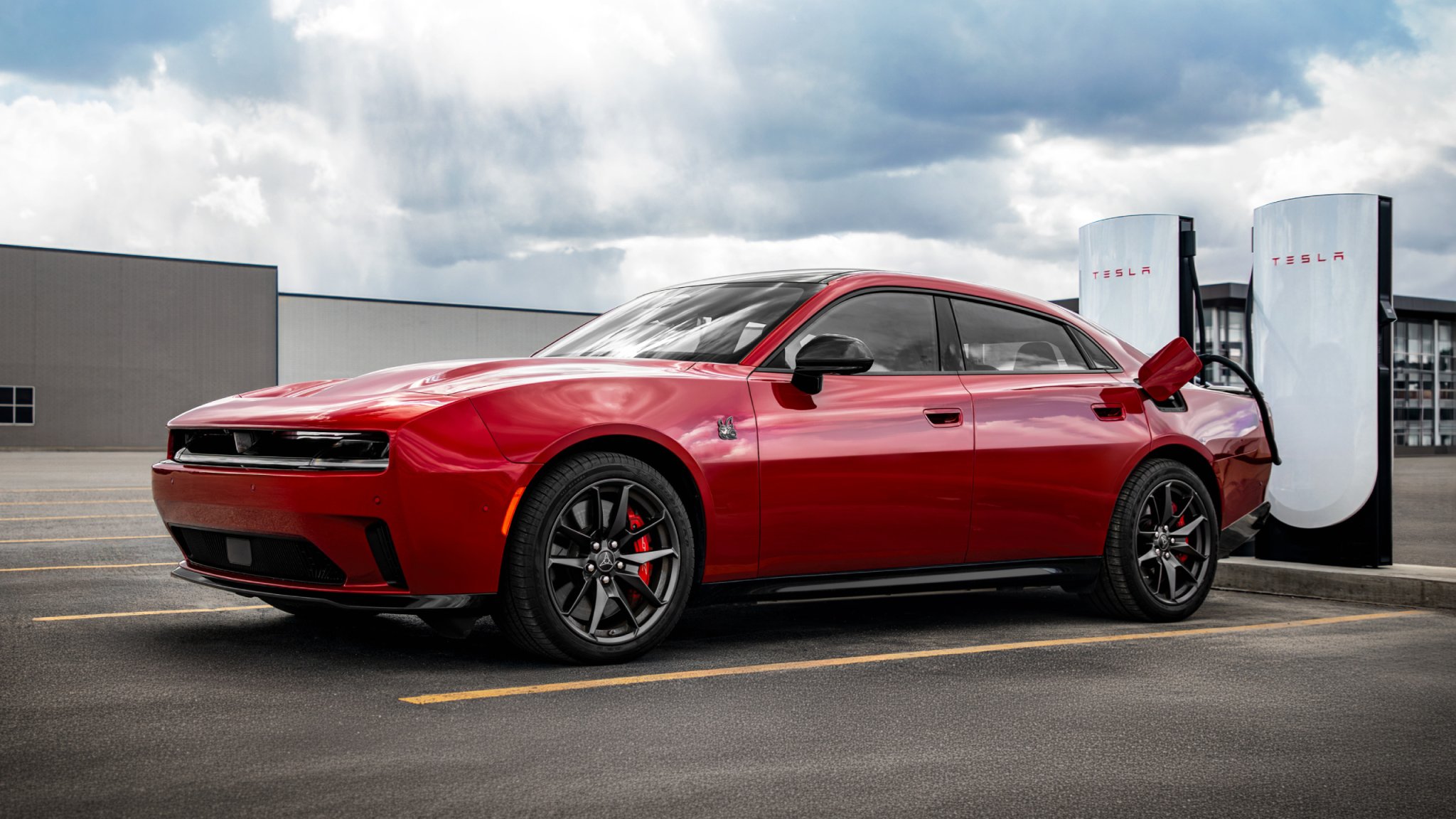 Dodge Charger EV at a Tesla Supercharger
