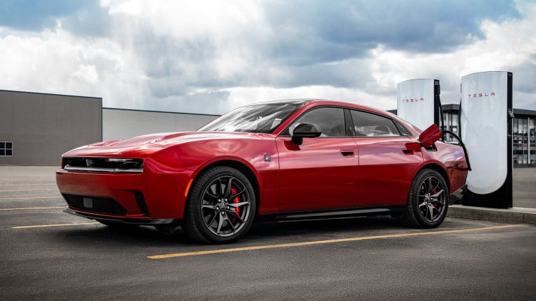 Dodge Charger EV at a Tesla Supercharger