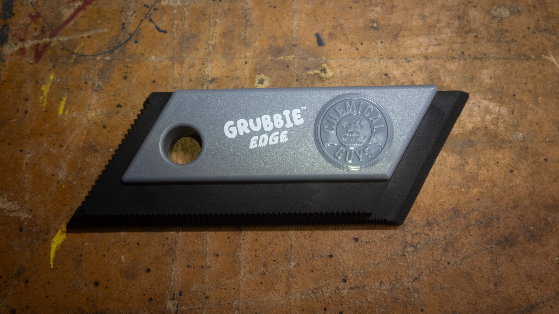 Chemical Guys pet hair removal tool.