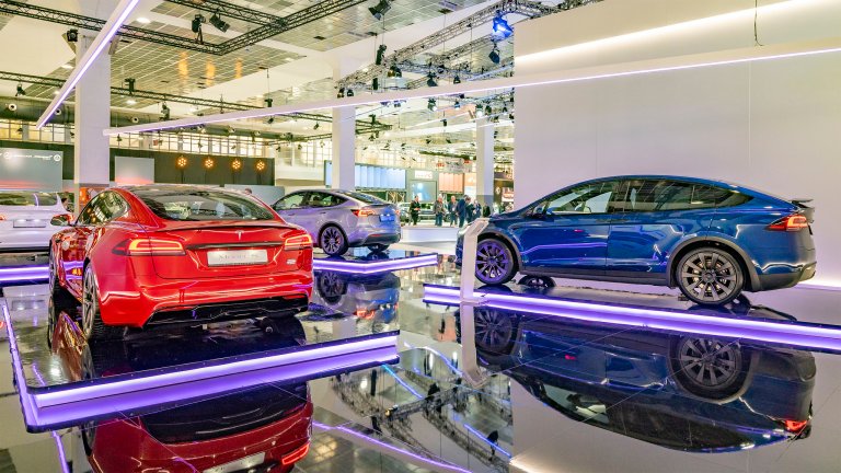 Tesla Model S and X on display at an auto show.