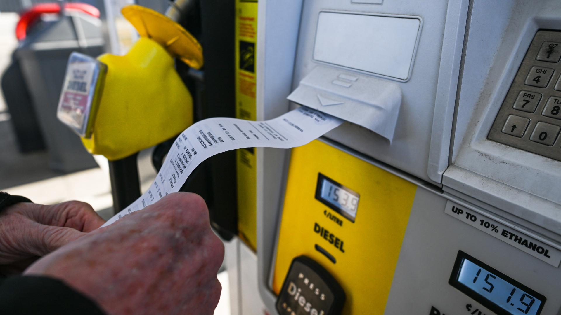 EDMONTON, CANADA - MARCH 31: A person collects the receipt following fuel payment at the pay-at-the-pump station in Edmonton, on March 31, 2024, in Edmonton, Alberta, Canada. Tomorrow, fuel prices will rise due to the Federal Carbon Tax increase. Canadians anticipate paying more for gasoline, diesel, and propane starting April 1st. All provincial premiers are concerned about the impact on those already grappling with the cost of living.