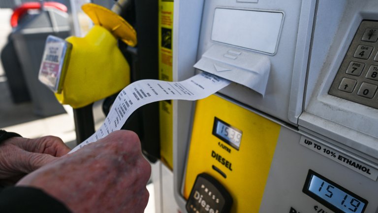 EDMONTON, CANADA - MARCH 31: A person collects the receipt following fuel payment at the pay-at-the-pump station in Edmonton, on March 31, 2024, in Edmonton, Alberta, Canada. Tomorrow, fuel prices will rise due to the Federal Carbon Tax increase. Canadians anticipate paying more for gasoline, diesel, and propane starting April 1st. All provincial premiers are concerned about the impact on those already grappling with the cost of living.