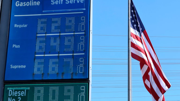 EL SEGUNDO, CALIFORNIA - APRIL 08: High gas prices are displayed at a Chevron gas station as an American flag flies on April 8, 2026 in El Segundo, California. California imports approximately 75 percent of its crude oil with nearly one-third of the crude supplied from the Middle East as prices at the pump in the state are averaging $5.93 per gallon today amid the war in Iran. (Photo by Mario Tama/Getty Images)