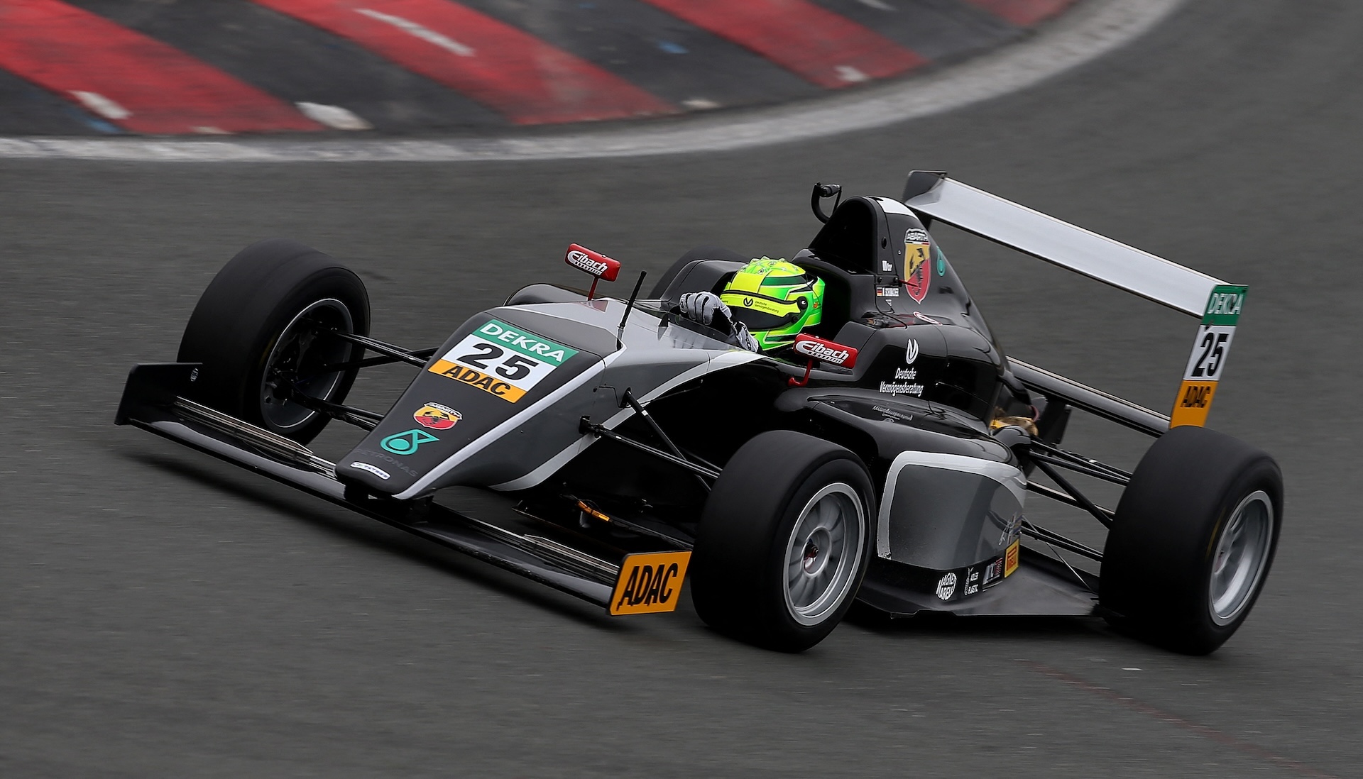 Mick Schumacher, son of former F1 champion Michael Schumacher, drives during the first day of the ADAC Formula Four pre-season tests in Oschersleben, Germany, on April 8, 2015. Mick Schumacher is the son of former Formula 1 driver Michael Schumacher. AFP PHOTO / RONNY HARTMANN (Photo by RONNY HARTMANN / AFP)