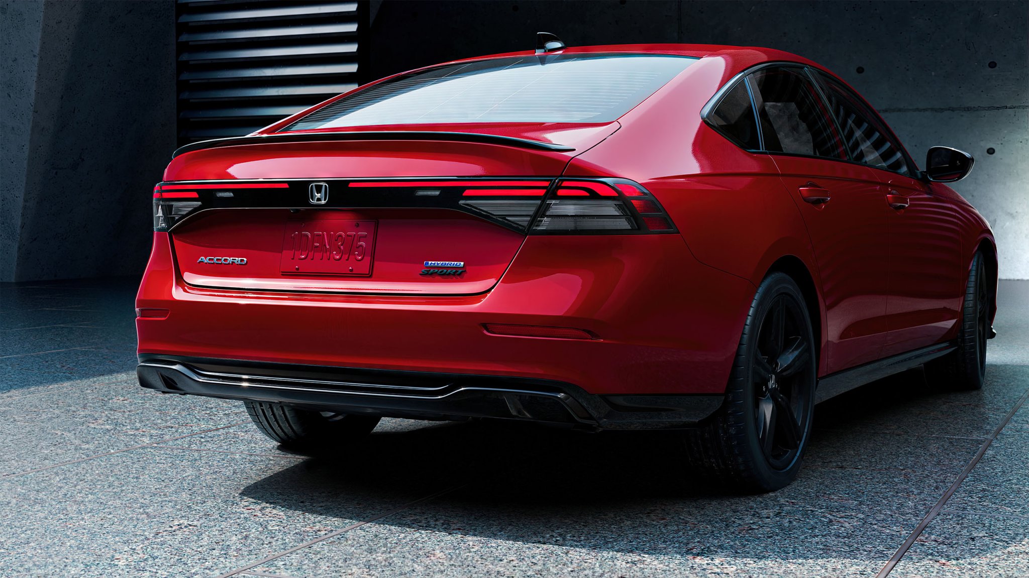 Red Honda Accord rear three-quarters view
