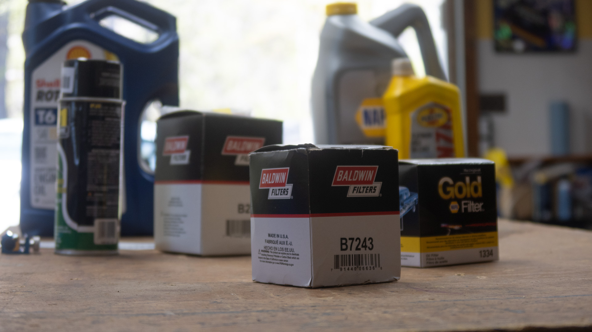 Oil change supplies on a desk.