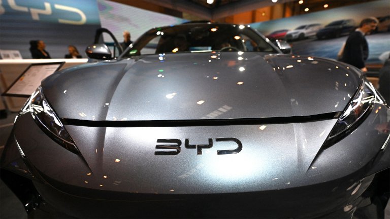 A logo of Chinese car manufacturer BYD is on display at the Essen Motor Show in Essen, western Germany on December 4, 2024.