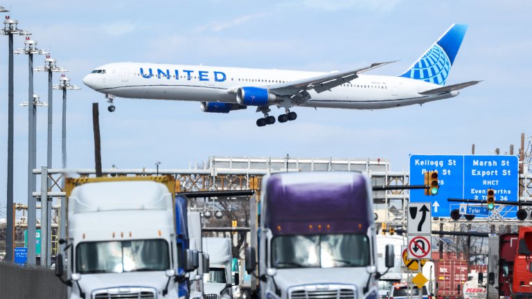 A United Boeing 767 about to land at Newark Liberty International Airport last year, flying over a highway.