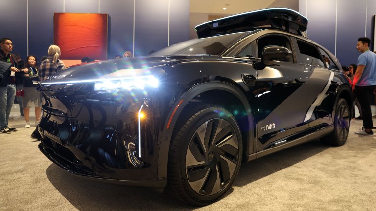 Lucid, Nuro, and Uber unveil a robotaxi during Nvidia Live at CES 2026 ahead of the annual Consumer Electronics Show in Las Vegas, Nevada, on January 5, 2026.