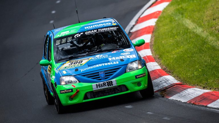 14 May 2026, Rhineland-Palatinate, Nürburg: The Dacia Logan with starting number 300 from the Ollis Garage Racing team with drivers Oliver Kriese, Christian Geilfus, Robert Neumann and Alexander Becker drives on the Nordschleife of the Nürburgring during Qualifying 1. Photo: Silas Stein/dpa (Photo by Silas Stein/picture alliance via Getty Images)