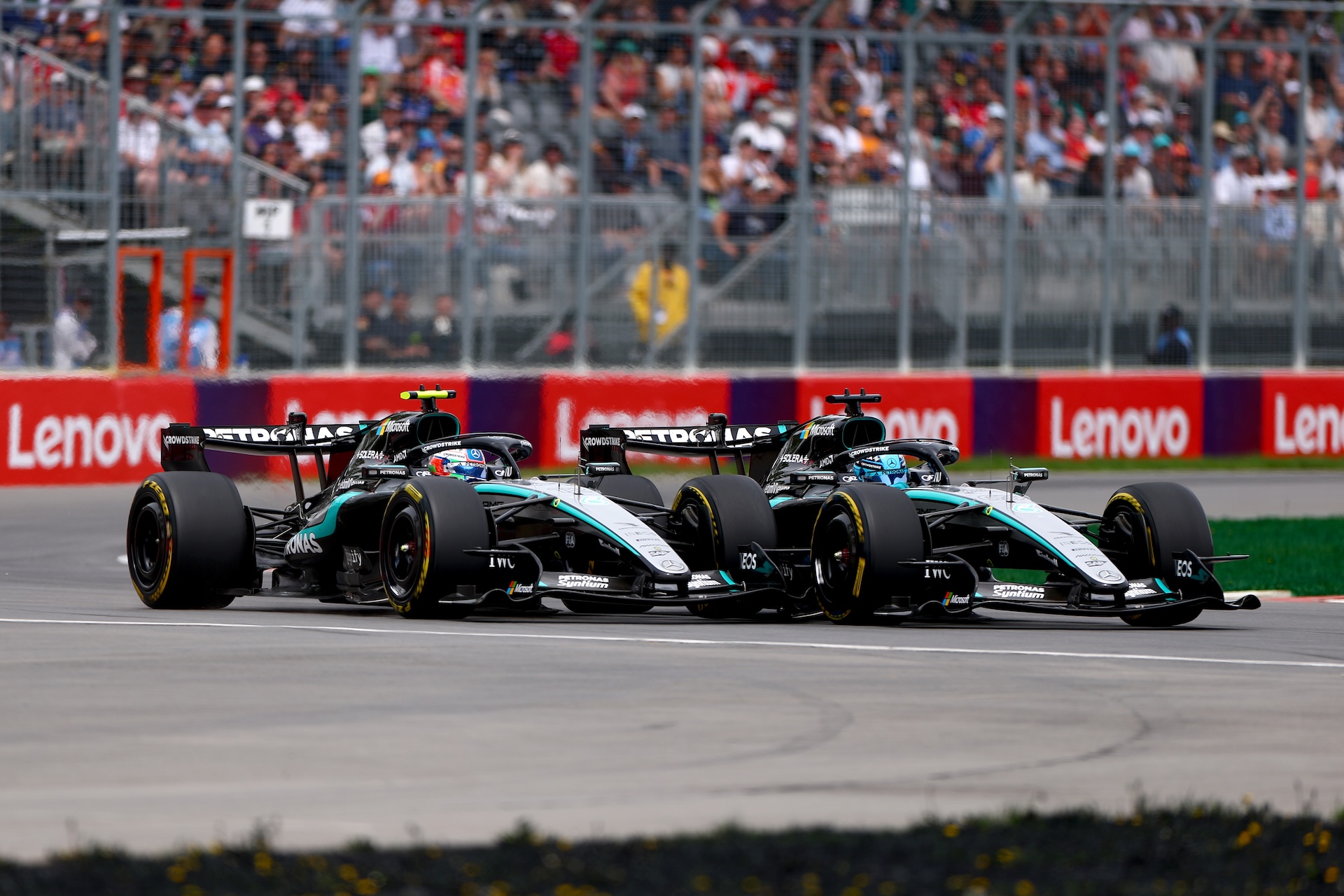 MONTREAL, QUEBEC - MAY 23: Andrea Kimi Antonelli of Italy driving the (12) Mercedes AMG Petronas F1 Team W17 and George Russell of Great Britain driving the (63) Mercedes AMG Petronas F1 Team W17 battle for the lead during the Sprint ahead of the F1 Grand Prix of Canada at Circuit Gilles-Villeneuve on May 23, 2026 in Montreal, Quebec. (Photo by Bryn Lennon - Formula 1/Formula 1 via Getty Images)