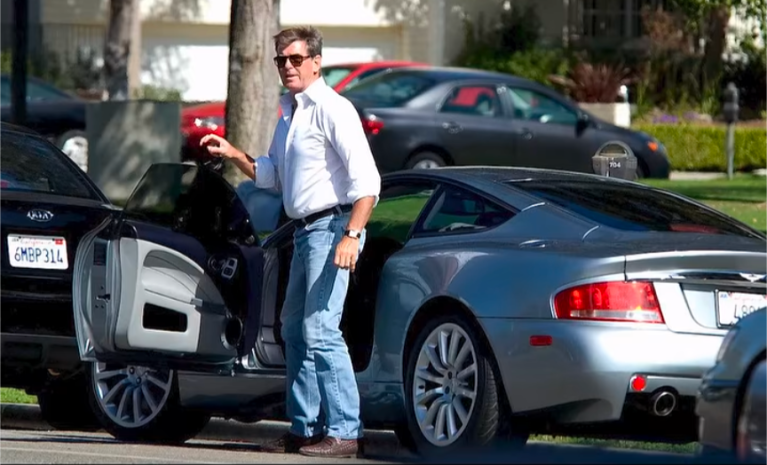 Pierce Brosnan and his Aston Martin Vanquish