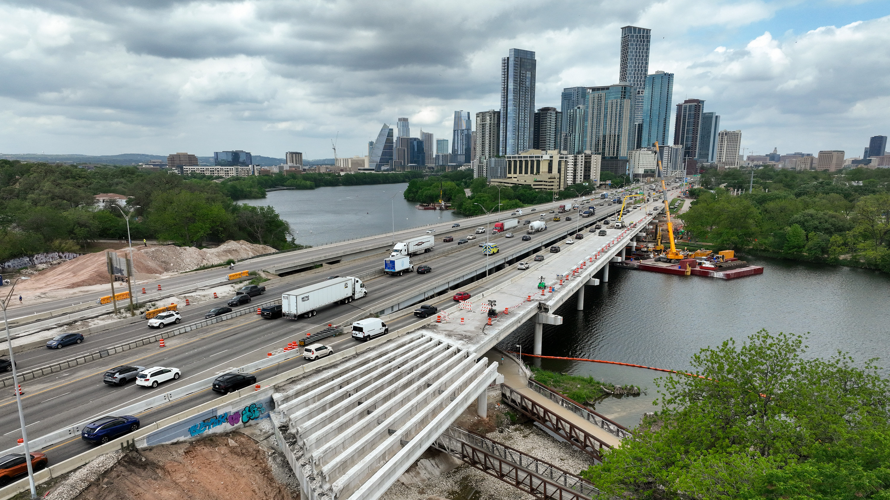 AUSTIN, TEXAS - APRIL 14: Work continues on the I-35 frontage road over Lady Bird Lake in Austin, Tuesday, April 14, 2026. Texas Department of Transportation contractors will begin work on a new pedestrian bridge over the lake as part of the I-35 Capital Express Central project, which is expected to last through at least 2033. (Jay Janner/The Austin American-Statesman via Getty Images)