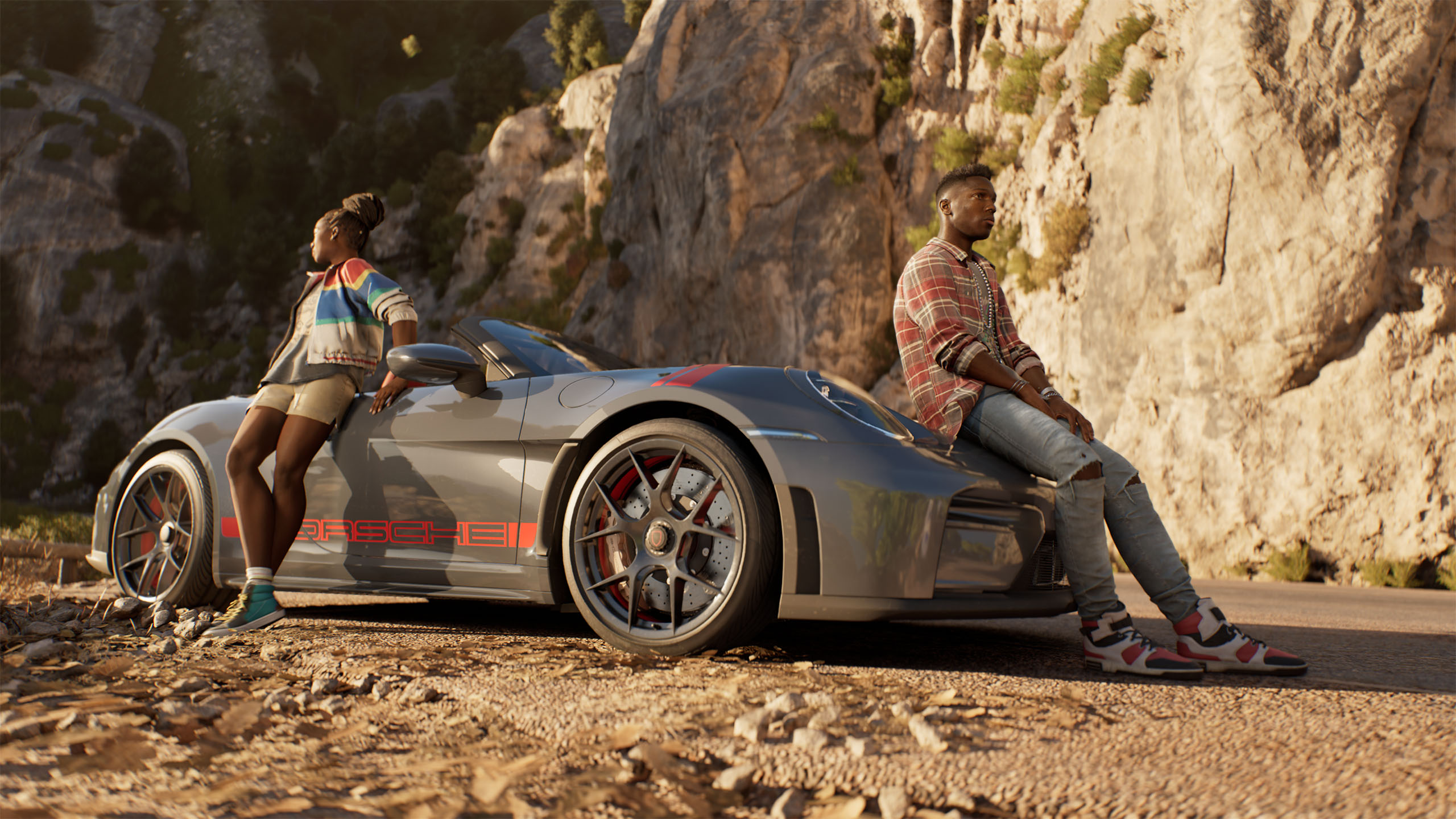 Two characters pose with a Porsche 911 GT3 S/C in the upcoming video game, "Clutch"