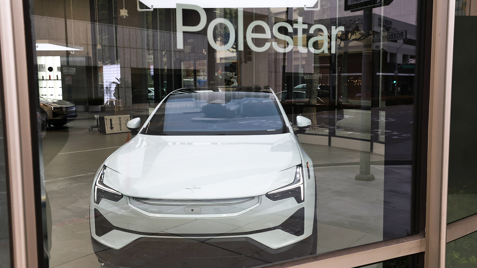 BEVERLY HILLS, CALIFORNIA - JUNE 26: A Polestar car is displayed in the showroom at a Polestar dealership on June 26, 2026 in Beverly Hills, California. Electric car maker Polestar will be barred from selling new vehicles in the United States starting with the 2027 model year after the Commerce Department cited national security concerns under new connected-vehicle regulations. (Photo by Justin Sullivan/Getty Images)