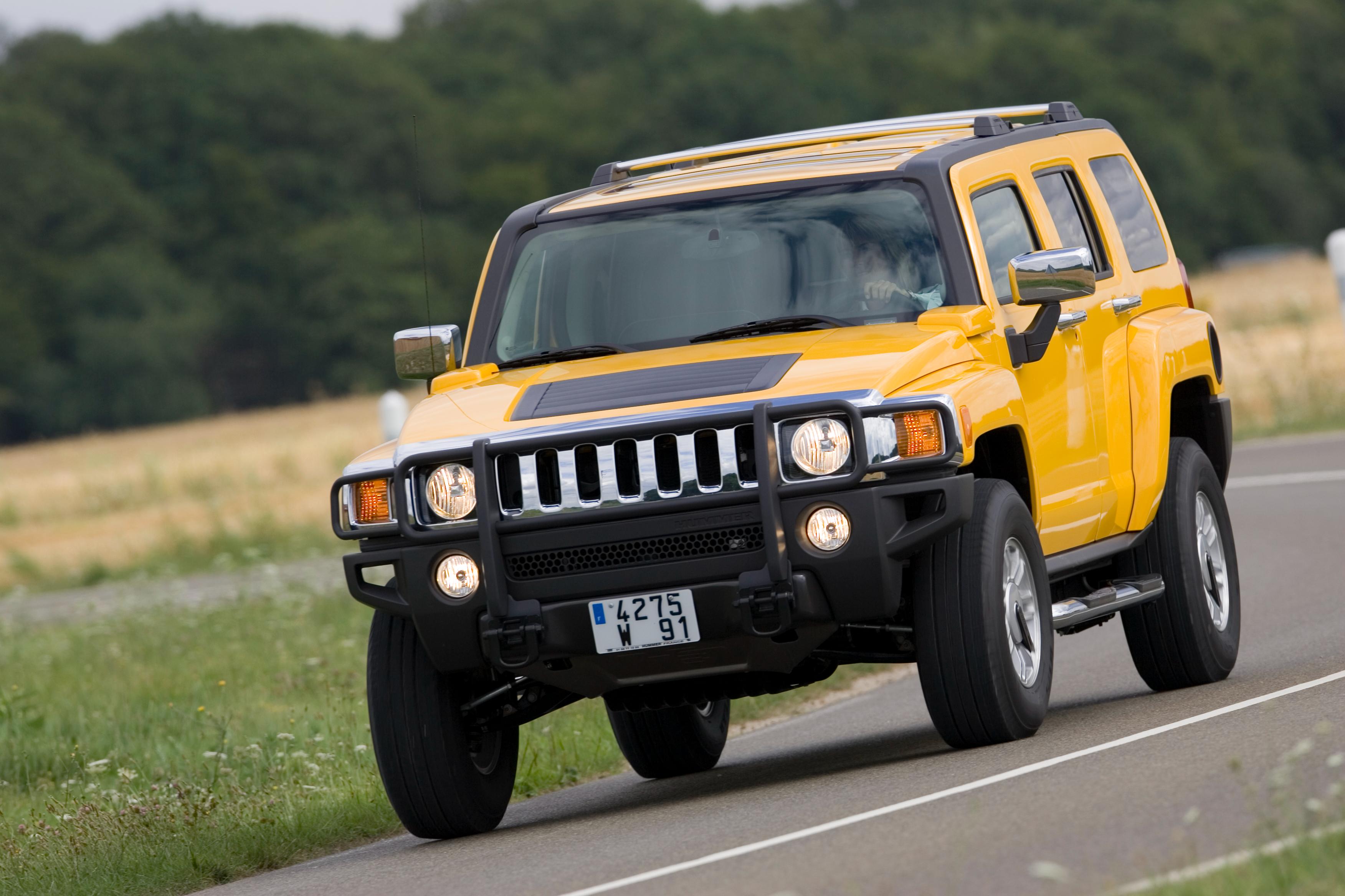GMC Hummer H2 in signature yellow