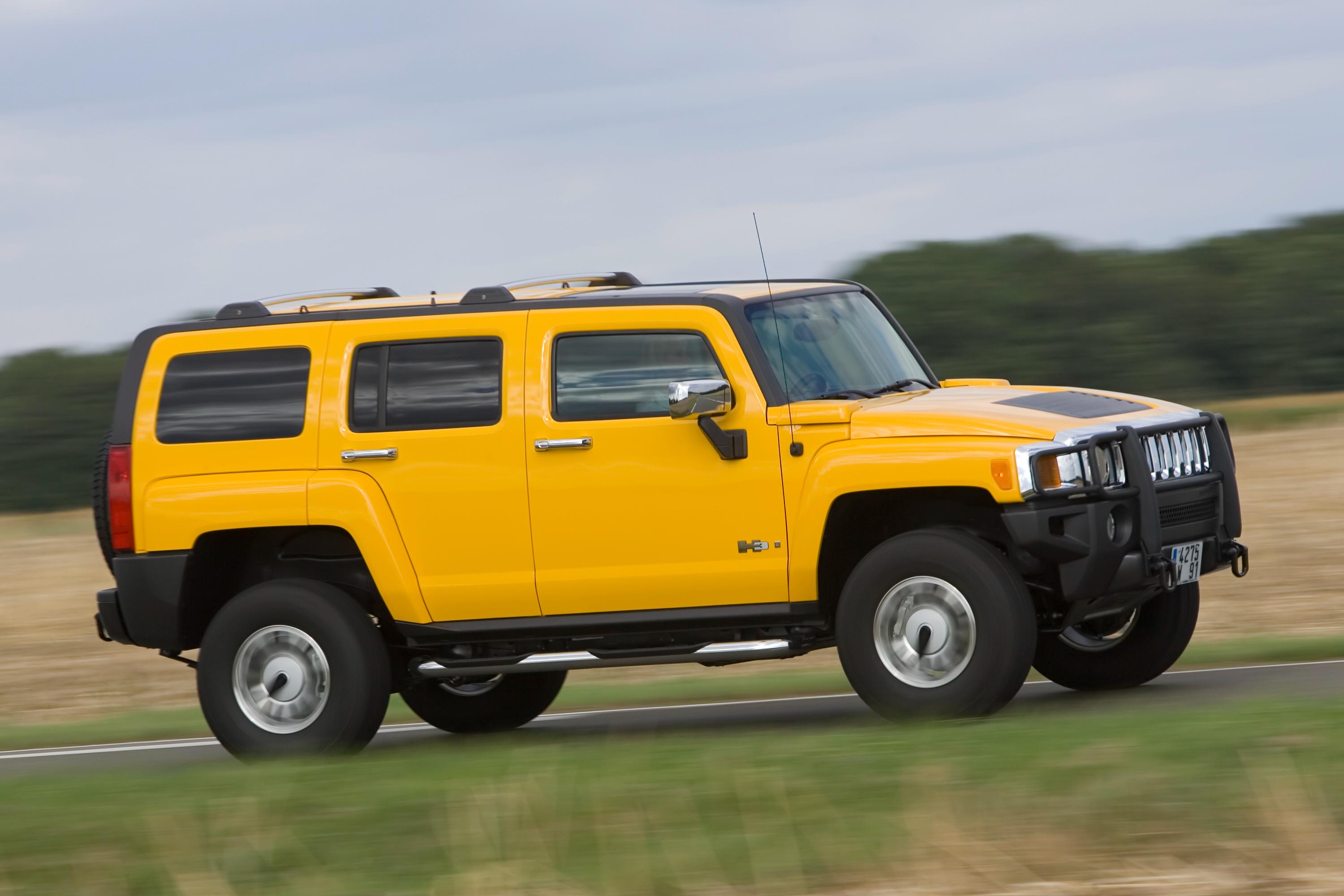 GMC Hummer H2 in signature yellow