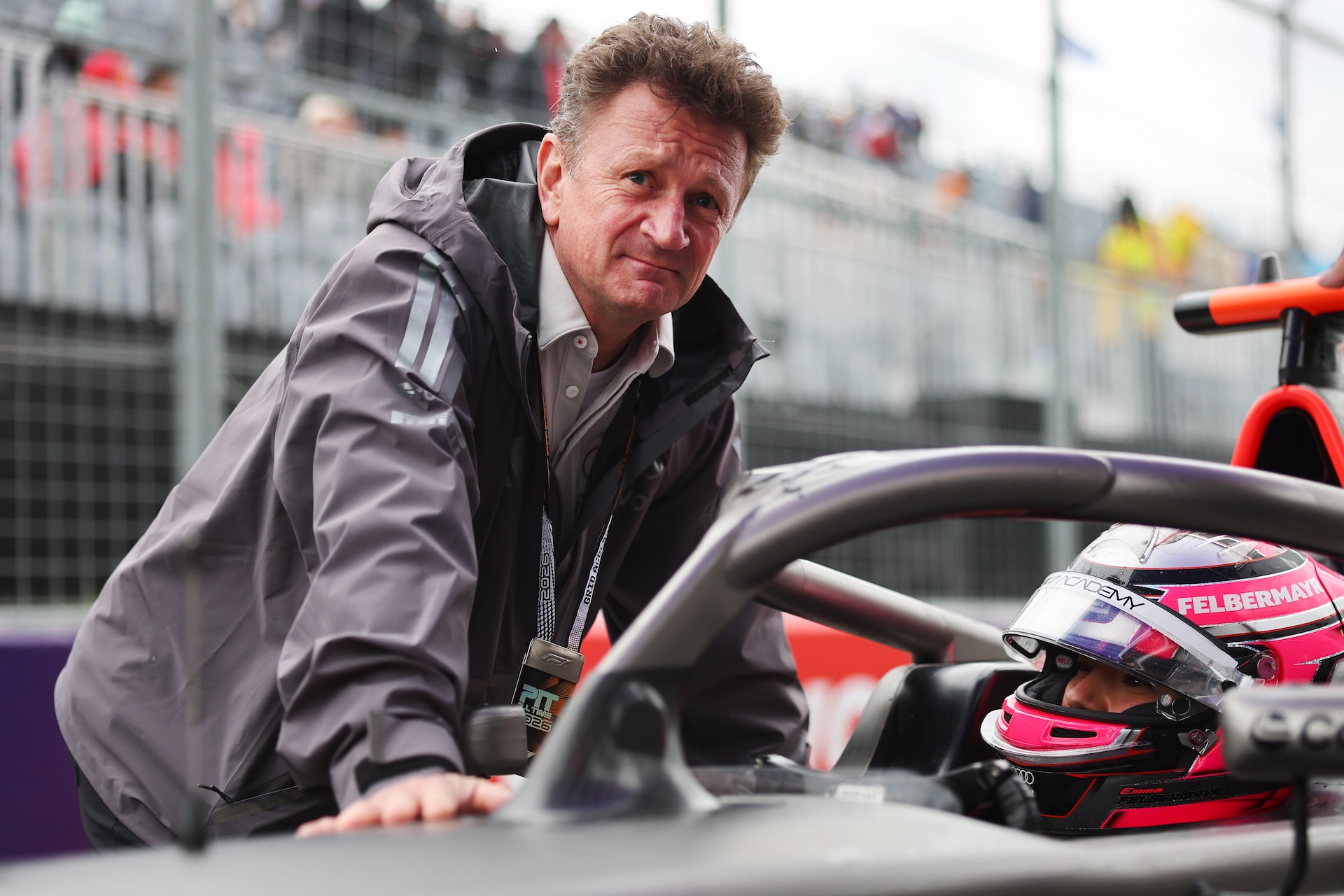 MONTREAL, QUEBEC - MAY 24: Allan McNish, Racing Director of Audi F1 Team talks with Emma Felbermayr of Austria and Rodin Motorsport (5) and Audi F1 Team on the grid during F1 Academy Round 2, race 3 at Circuit Gilles Villeneuve on May 24, 2026 in Montreal, Quebec. (Photo by Andy Hone/LAT Images)