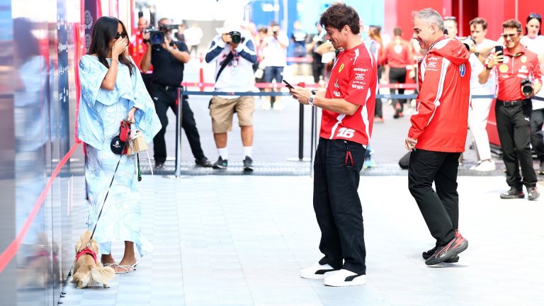 BUDAPEST, HUNGARY - JULY 24: Charles Leclerc of Monaco and Scuderia Ferrari and Alexandra Leclerc in the Paddock with Leo prior to practice ahead of the F1 Grand Prix of Hungary at Hungaroring on July 24, 2026 in Budapest, Hungary. (Photo by Clive Mason/Getty Images)