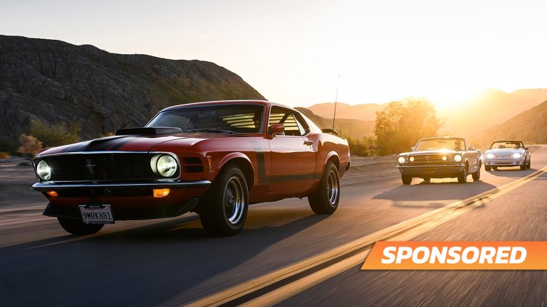 Fleet of Mustangs driving through canyons.