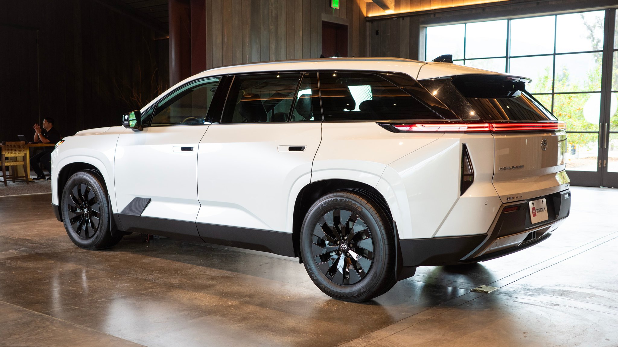 Toyota Highlander EV rear three-quarter view