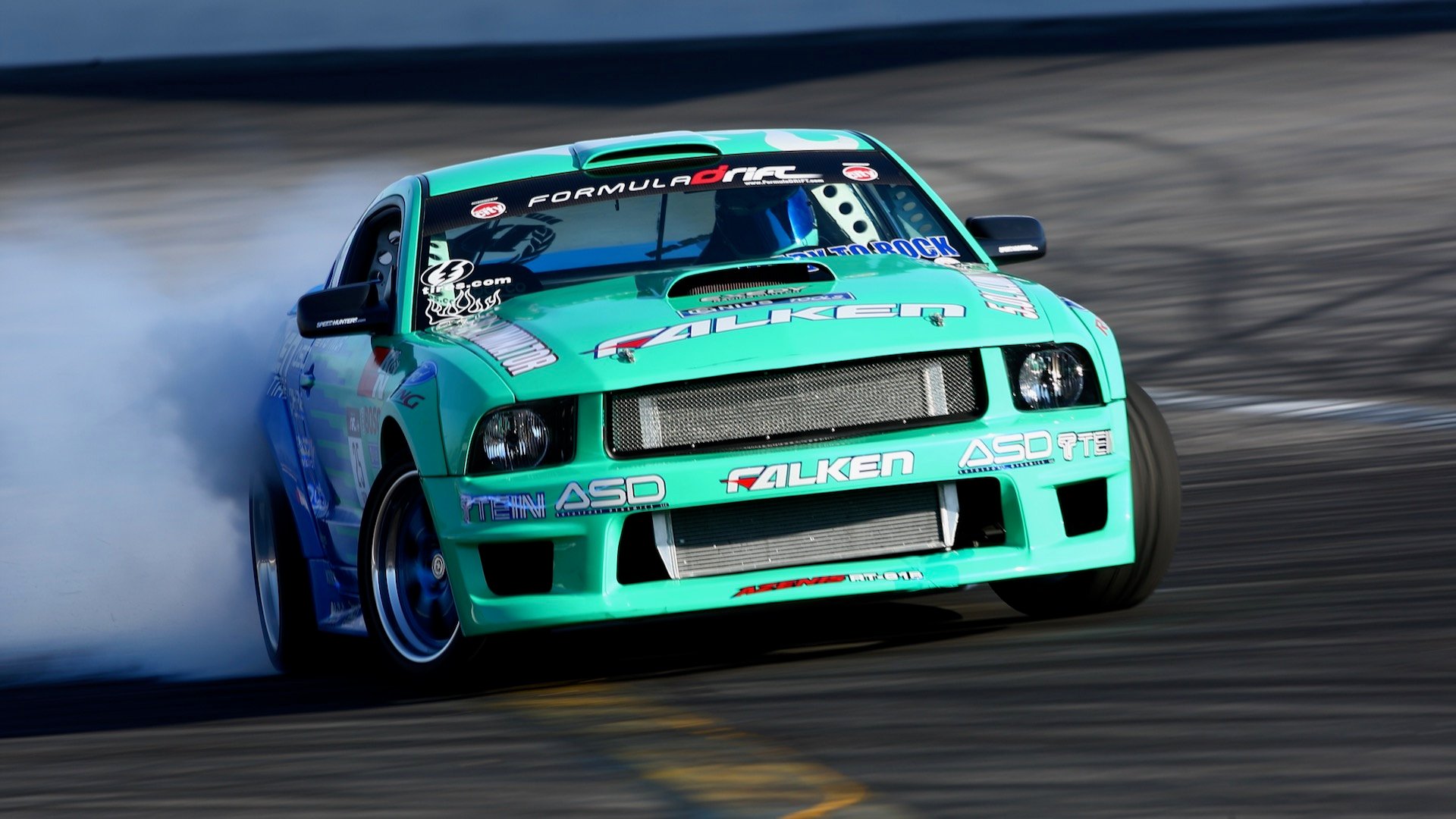 Vaughin Gittin Jr. drifts a Ford Mustang