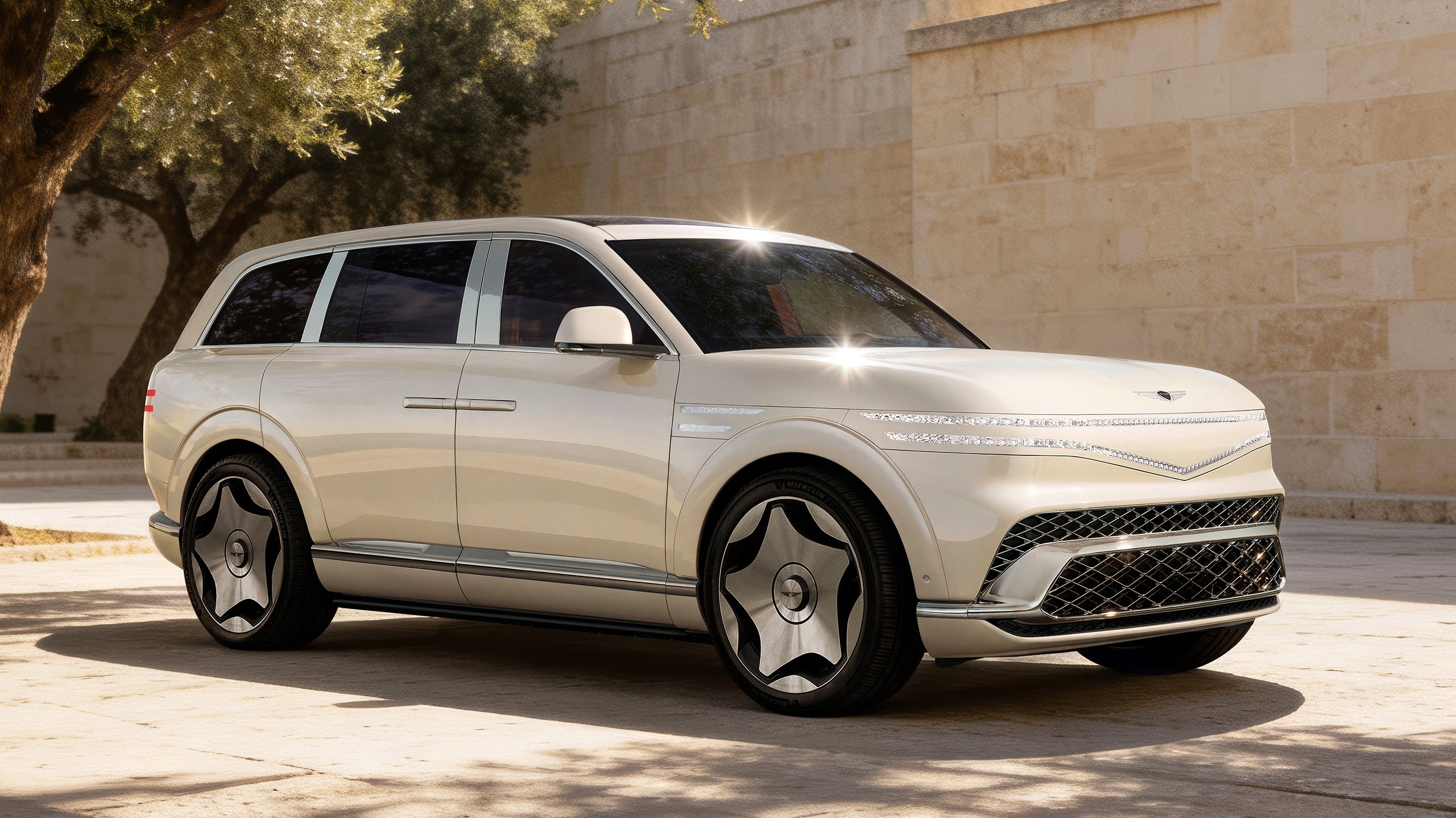 Genesis GV90 front three-quarters in white